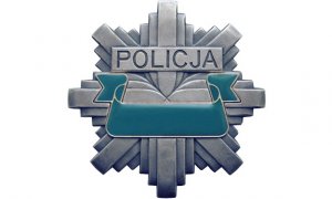 odznaka policyjna z napisem POLICJA