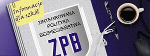 teczka z napisem ZPB, obok kawa i długopis