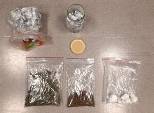 amfetamina i marihuana w foliowych workach strunowych i słoiku