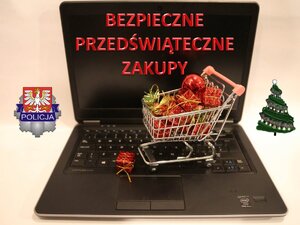 laptop, napis bezpieczne przedświąteczne zakupy, wózek z prezentami